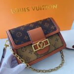 Mini Dauphine Shoulder Bag Gold Hardware Ebene Reverse Monogram Coated Canvas for women